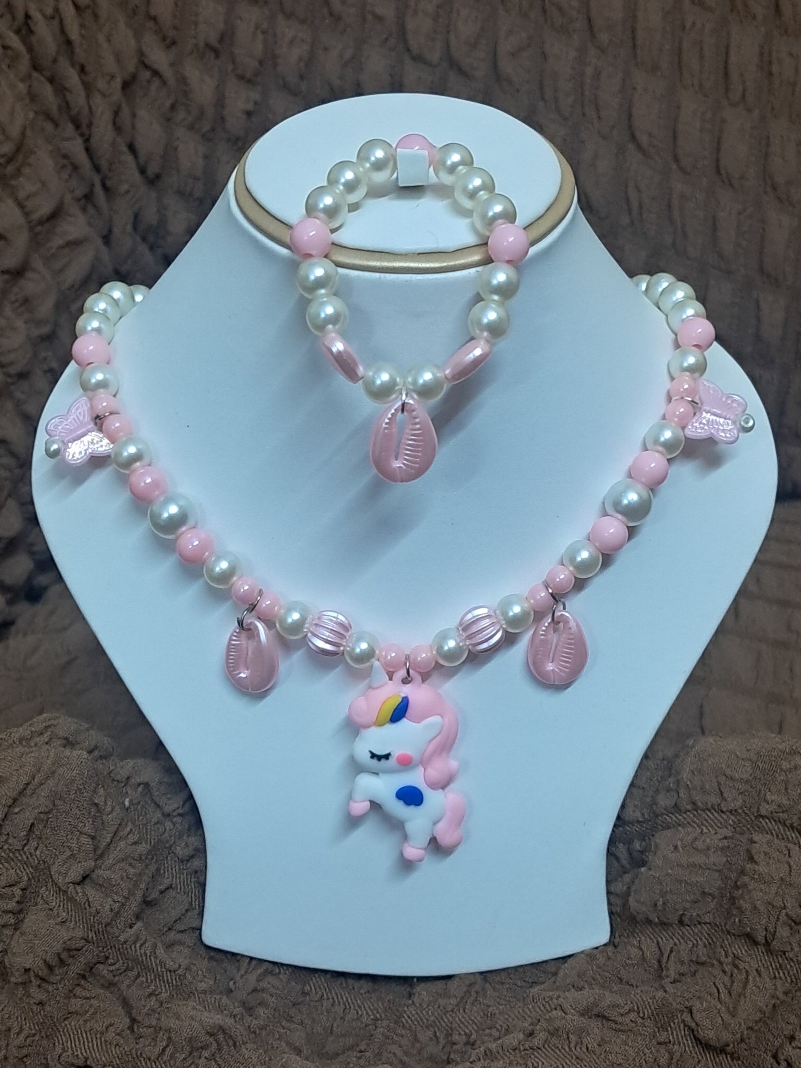 rn-image_picker_lib_temp_11061e6a-6fac-4322-be6f-dc2b6c94f619 Baby Pink Pearl Beaded Unicorn Necklace and Bracelet Set for Girls | GARIMAS