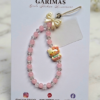 Garimas- Hello Kitty mobile charm features a pink and crystal beaded wrist strap adorned with an bow
